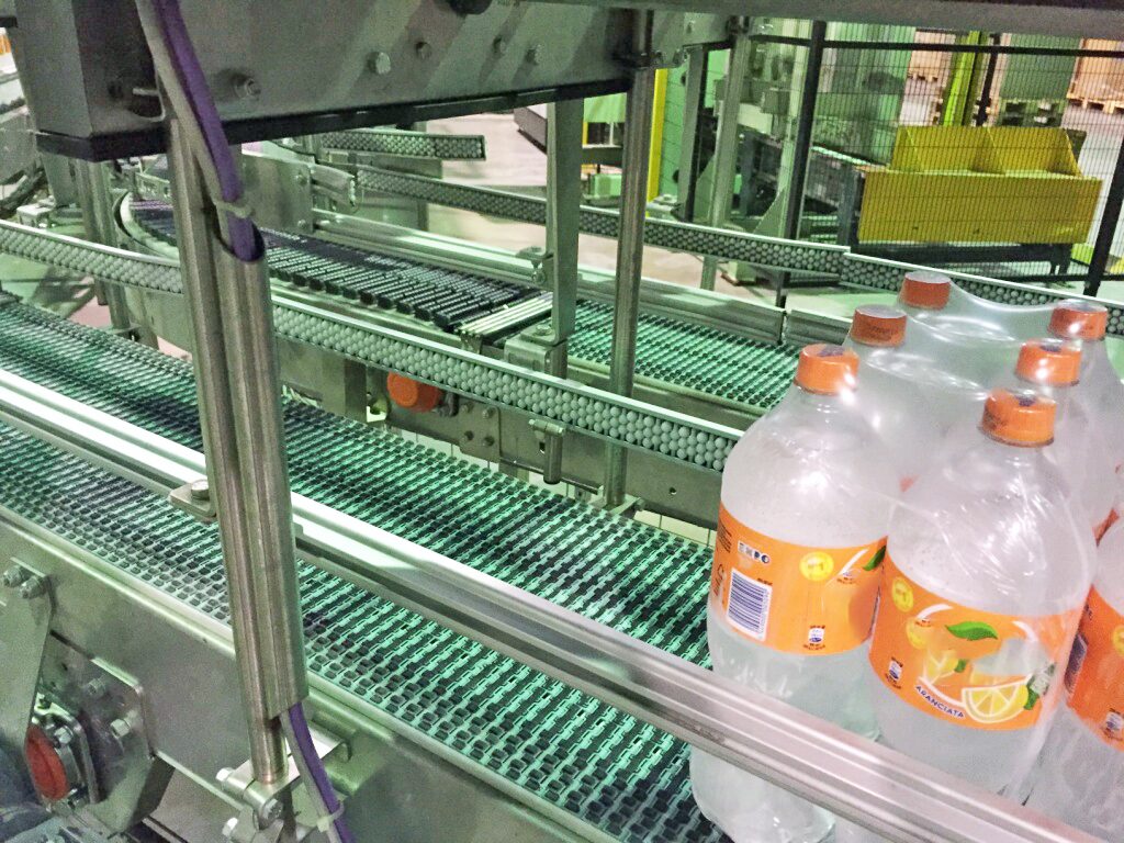 Bandas transportadoras de botellas: tipos y criterios de elección